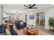 Open-concept living and dining area with modern light fixture, hardwood floors and neutral color palette at 1515 Jonesboro Se Rd, Atlanta, GA 30315