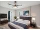 Tranquil main bedroom with a large bed, modern lighting, and an en-suite bathroom at 1515 Jonesboro Se Rd, Atlanta, GA 30315