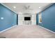 Finished basement features built-in shelving and plush carpet at 6665 Flagstone Ct # 918, Cumming, GA 30028