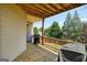 Spacious back deck with grill and a view of trees at 6665 Flagstone Ct # 918, Cumming, GA 30028