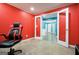 Office features red walls, white trim, and glass french doors at 6665 Flagstone Ct # 918, Cumming, GA 30028