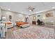 Spacious main bedroom with vinyl floors, a ceiling fan, and lots of natural light at 1535 Smoke Hill Dr, Hoschton, GA 30548
