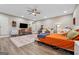 Expansive main bedroom featuring vinyl floors, a ceiling fan, lots of space and natural light at 1535 Smoke Hill Dr, Hoschton, GA 30548