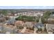 Residential neighborhood with tree-lined streets and various architectural styles of homes at 2126 Roberts View Trl, Buford, GA 30519