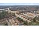 Aerial view showcases the neighborhood's proximity to the road, offering easy access to nearby areas at 2126 Roberts View Trl, Buford, GA 30519