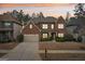 Charming two-story brick home featuring a two-car garage and manicured landscaping at 2126 Roberts View Trl, Buford, GA 30519