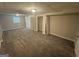 Cozy finished basement with plush carpet, closet and access to unfinished storage at 4329 Parkview Dr, Lithia Springs, GA 30122