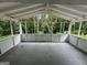 Relax on this screened porch with a natural view at 4329 Parkview Dr, Lithia Springs, GA 30122