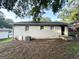 Backyard view of home with clean exterior, showcasing potential for outdoor living at 70 Macon Se Pl, Atlanta, GA 30354