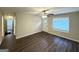 Bright living room with a ceiling fan, modern flooring, and ample natural light at 70 Macon Se Pl, Atlanta, GA 30354