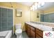 Bathroom with modern sink, granite countertop, and tiled walls at 2101 Newgate, Decatur, GA 30035