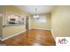 Bright dining area with hardwood floors, view to the kitchen and natural light at 2101 Newgate, Decatur, GA 30035