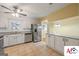 Spacious kitchen featuring stainless steel appliances and granite countertops, adjacent to dining area at 2101 Newgate, Decatur, GA 30035