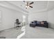 Bonus room with ceiling fan, desk, chair and a dark-blue sofa at 469 Ralph Still, Dacula, GA 30019