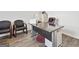 Office space with desk, chairs, and natural light, providing a comfortable and functional workspace at 469 Ralph Still, Dacula, GA 30019
