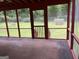 Cozy screened-in porch overlooking a lush backyard at 7562 Asbury Manor, Lithonia, GA 30058