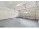 Spacious two-car garage with lots of lighting at 686 Shore Ln, Lithonia, GA 30058
