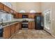 Bright kitchen with stainless steel appliances, ample cabinet space, and arched windows at 686 Shore Ln, Lithonia, GA 30058