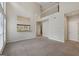 Expansive living area showcasing an open floor plan, and neutral-toned walls at 686 Shore Ln, Lithonia, GA 30058