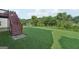 Green lawn with stairs leading to a deck, providing a great outdoor space at 4738 Golod Way, Lithonia, GA 30038