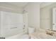 Clean, tiled bathroom with a shower and tub combo and a sink with vanity at 4738 Golod Way, Lithonia, GA 30038