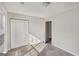 Comfortable bedroom featuring neutral carpet, a double-door closet, and an entry to another room at 4738 Golod Way, Lithonia, GA 30038