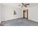 A bedroom with a ceiling fan and a closet at 4705 Ernest Dr, Forest Park, GA 30297