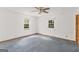 Bedroom featuring two windows and a closet at 4705 Ernest Dr, Forest Park, GA 30297