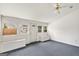 Bright bonus room with lots of natural light, built-in benches, and neutral walls at 4705 Ernest Dr, Forest Park, GA 30297