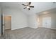 Spacious bedroom with carpet flooring, vaulted ceiling, ceiling fan, and ample closet space at 6005 Crowley Dr, Douglasville, GA 30135