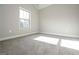 Bedroom with carpeted floor and window at 6005 Crowley Dr, Douglasville, GA 30135