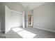 Bedroom featuring an open closet and ensuite bathroom at 6005 Crowley Dr, Douglasville, GA 30135