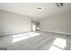 Large bonus room featuring neutral carpeting, light walls and trim, and abundant natural light at 6005 Crowley Dr, Douglasville, GA 30135