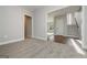 Hallway featuring neutral carpeting, light walls and trim, and access to stairs at 6005 Crowley Dr, Douglasville, GA 30135