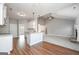 Open concept kitchen and living area with granite counters and stainless steel appliances at 6005 Crowley Dr, Douglasville, GA 30135