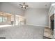 Large open-concept living room with a fireplace and seamless flow to other rooms at 6005 Crowley Dr, Douglasville, GA 30135