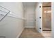Spacious walk-in closet with shelving for ample storage at 6005 Crowley Dr, Douglasville, GA 30135