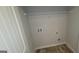 A small laundry room with hookups for washer and dryer, features modern and clean interior at 3484 Enterkin Ln, South Fulton, GA 30349