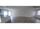 Open-concept living room with hardwood flooring, seamlessly connected to the modern kitchen at 3484 Enterkin Ln, South Fulton, GA 30349