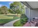 Relaxing gray exterior with a view of a lush, landscaped yard at 9 Warrior Way, Sharpsburg, GA 30277