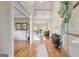 Grand two-story foyer with hardwood floors, elegant staircase, and stylish decor at 9 Warrior Way, Sharpsburg, GA 30277