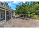 This private backyard boasts an expansive patio and outdoor living space for dining and relaxing at 308 Larkspur Turn, Peachtree City, GA 30269