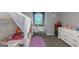 Adorable room with canopy bed, plush rug and ample storage space to keep things tidy at 308 Larkspur Turn, Peachtree City, GA 30269