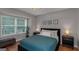 Cozy bedroom with a comfortable bed, stylish nightstands, and a window, offering a serene and inviting retreat at 308 Larkspur Turn, Peachtree City, GA 30269