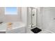 This bathroom features a soaking tub and standing shower with gray paint at 12167 Conrad Cir, Hampton, GA 30228