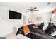 This spacious main bedroom offers ample natural light with black and white color themes at 12167 Conrad Cir, Hampton, GA 30228