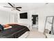 This spacious main bedroom offers ample natural light and leads to the bathroom at 12167 Conrad Cir, Hampton, GA 30228
