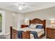 Comfortable bedroom with nice furniture and ceiling fan and closet at 183 Wynnmeade, Peachtree City, GA 30269