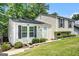 Charming home featuring manicured landscaping and classic architectural details, creating inviting curb appeal at 183 Wynnmeade, Peachtree City, GA 30269