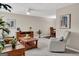 Bright living room with neutral tones, cozy seating, and stylish decor creating a welcoming atmosphere at 183 Wynnmeade, Peachtree City, GA 30269
